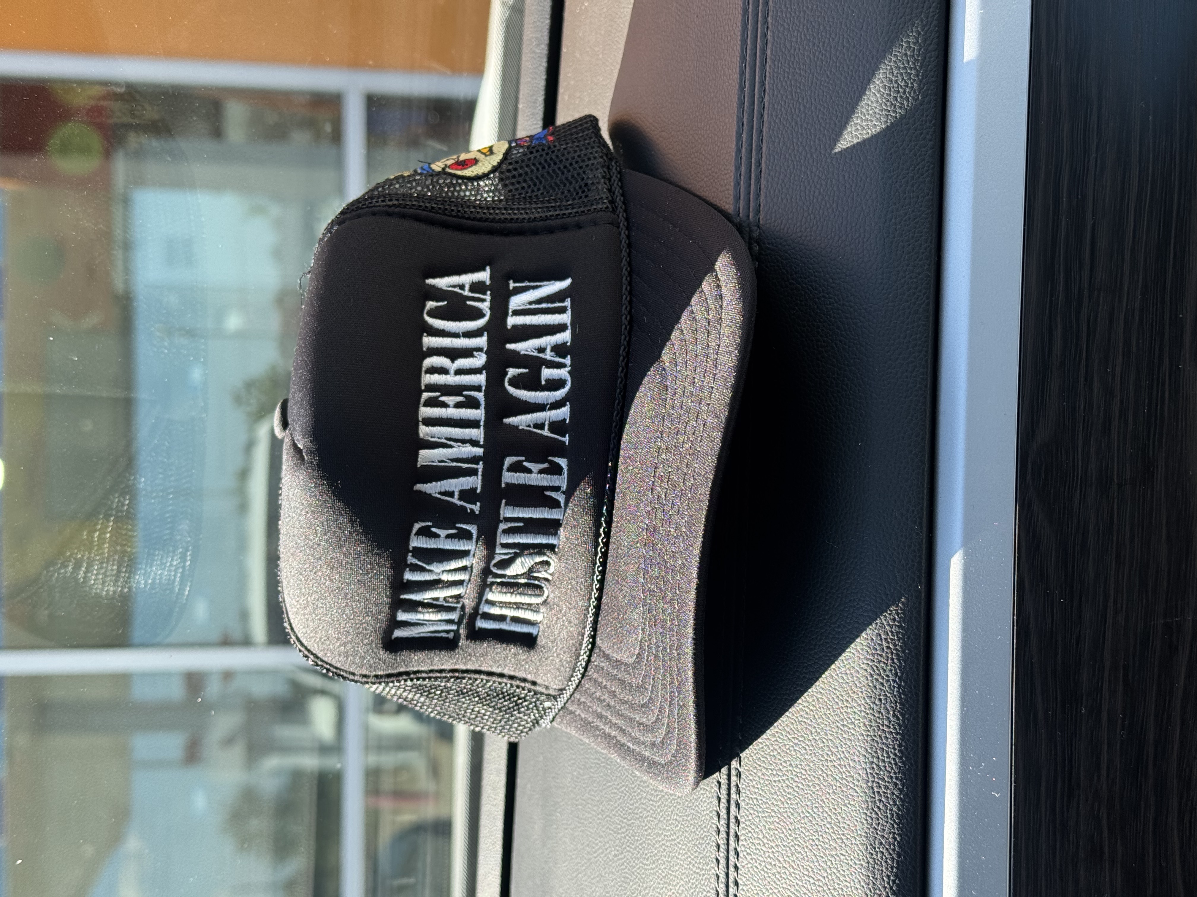 MAHA Make America Hustle Again trucker hat, black colorway