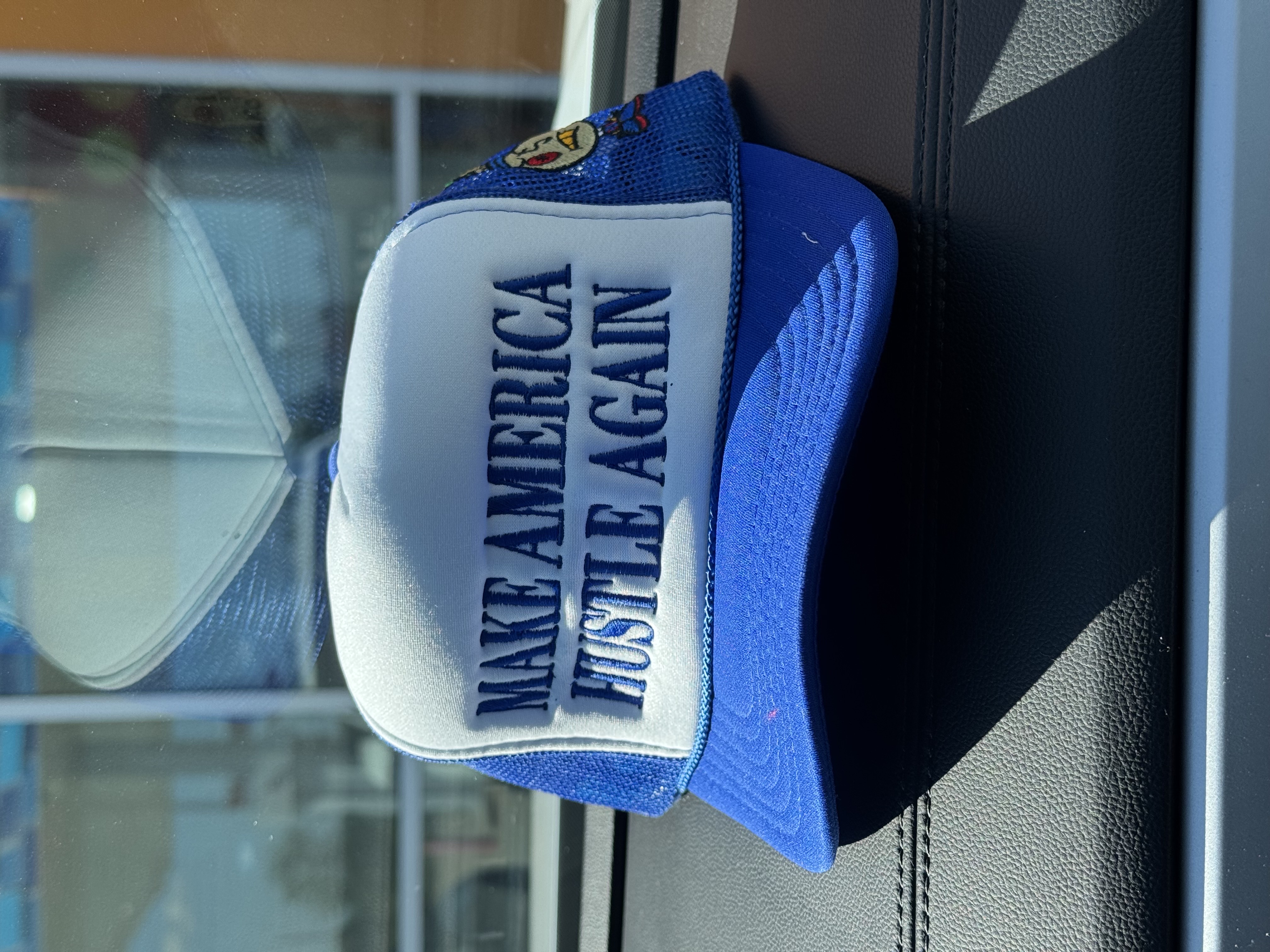 MAHA Make America Hustle Again trucker hat, royal blue colorway